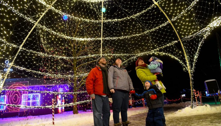 Family under igloo at Rotary Winter Wonderland