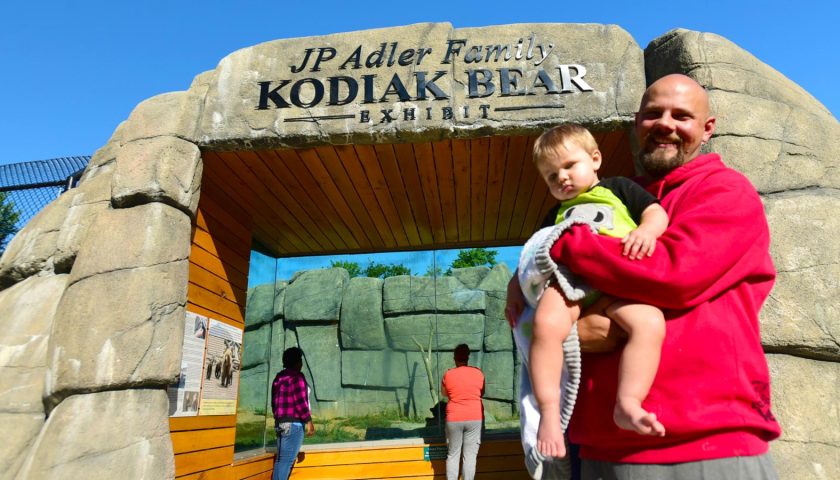 Summer attractions you shouldn’t miss | Family at Kodiak bear exhibit at Wildwood Park & Zoo Marshfield WI
