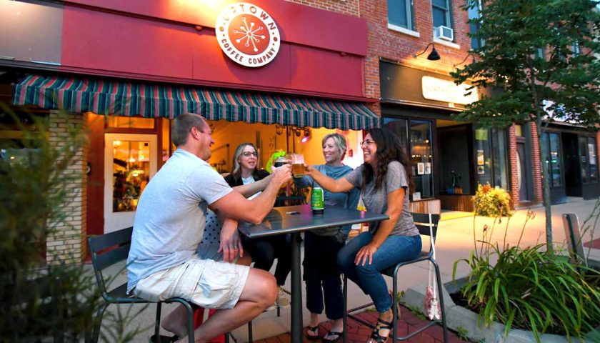 Outdoor dining options in Marshfield | People sitting outside at Uptown Coffee Company Marshfield WI