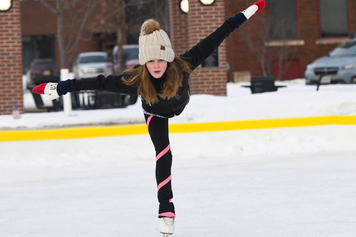 Girl ice skating at Wenzel Family Plaza in downtown Marshfield WI