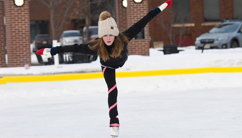 Girl ice skating at Wenzel Family Plaza in downtown Marshfield WI